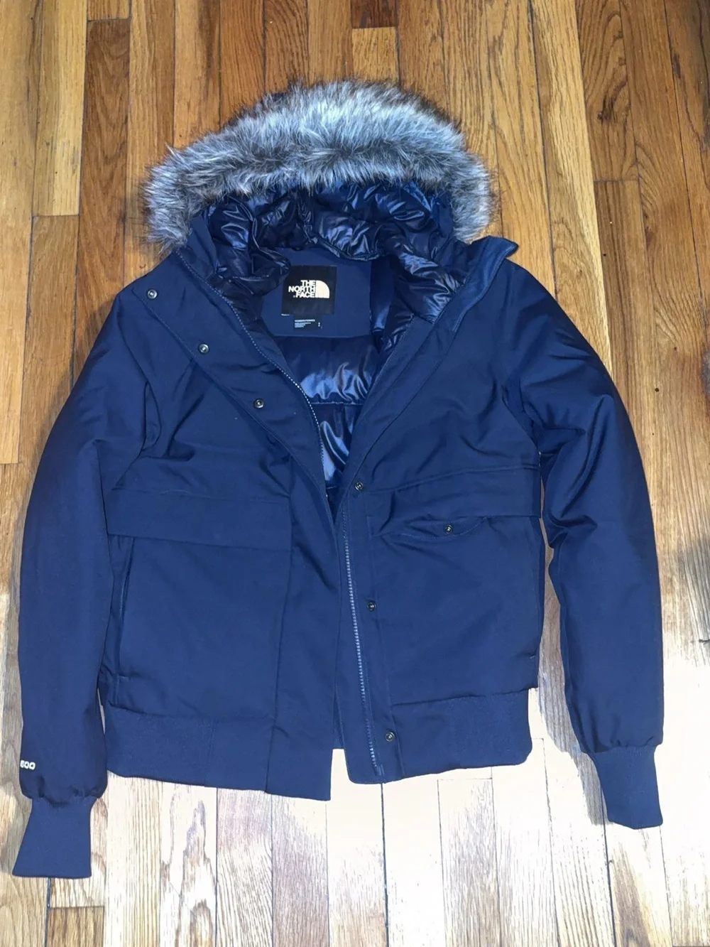 The North Face women’s Navy Puffer Jacket with Faux Fur Trim Hood